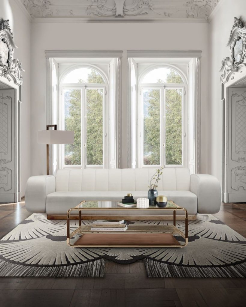 white sofa, golden coffee table, decorative elements