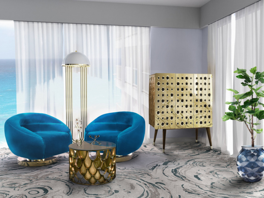 Drake Anderson Modern Living Room Ideas - This living room by Brabbu has  blue armchairs
